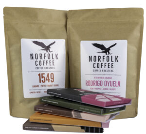 Two bags of coffee and five bars of chocolate making up Norfolk Coffee & Chocolate Bundle